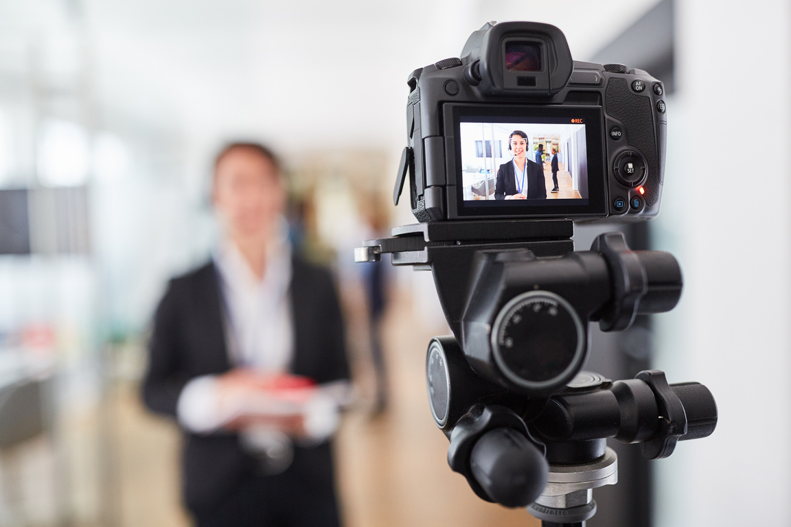 Video Camera When Recording a Business Woman